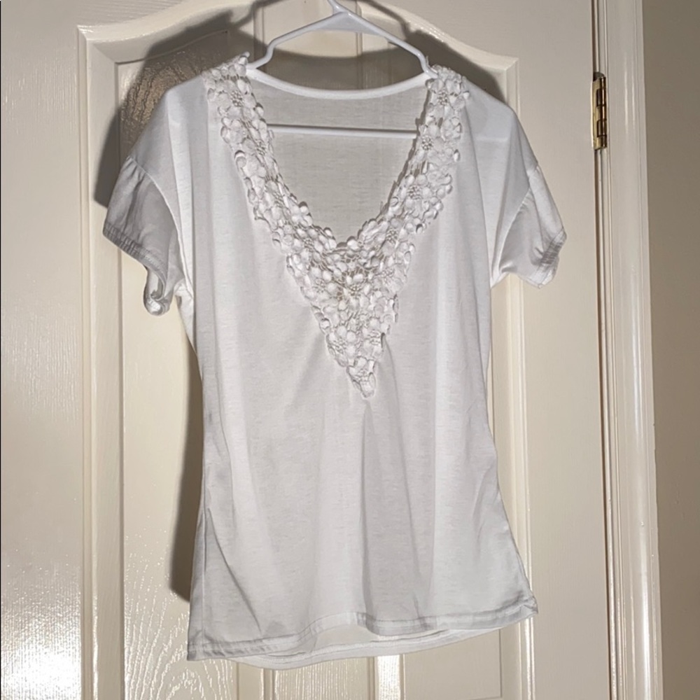 White t-Shirt w/flowered lace around chest. Large